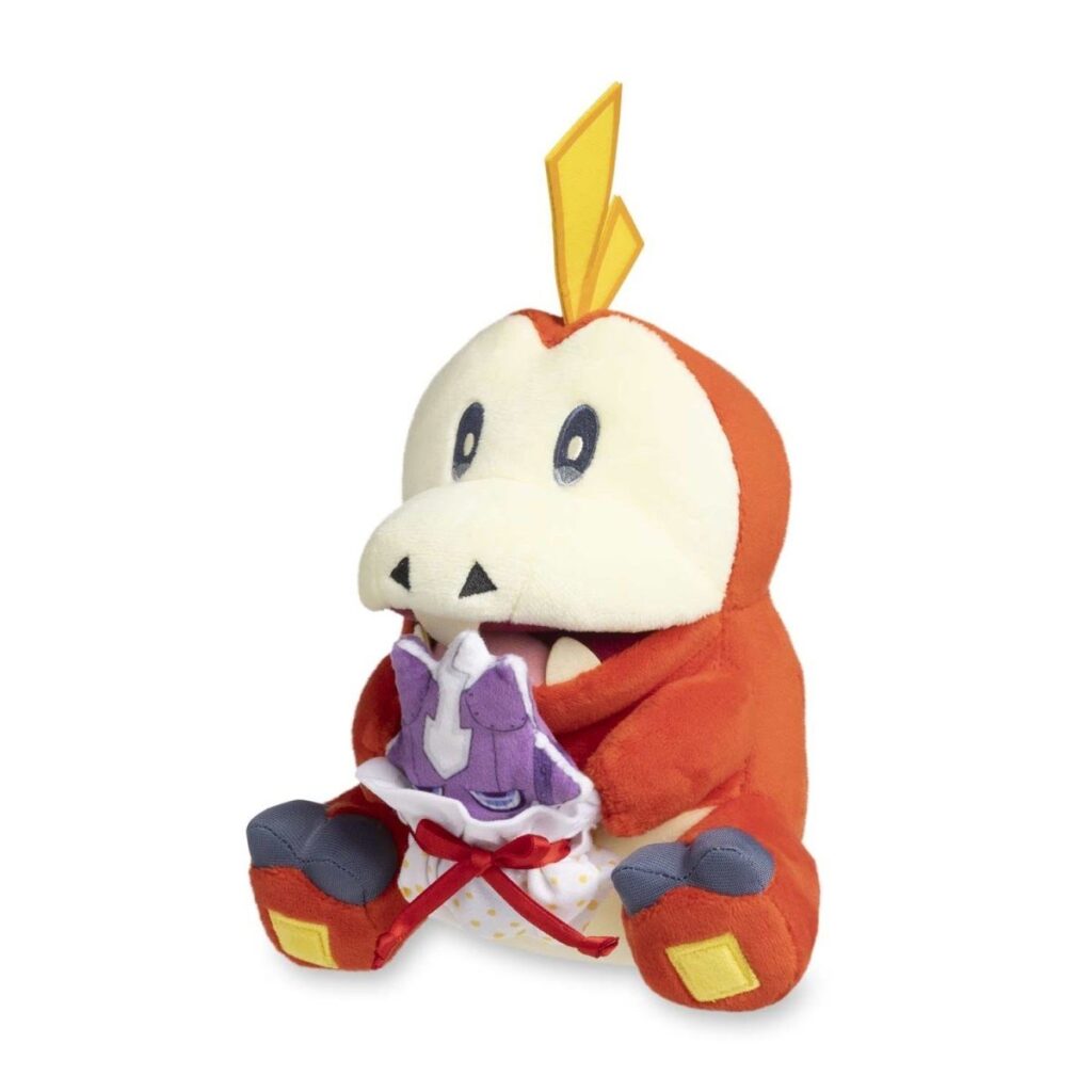 00eca894-2e47-53a3-b81f-18e94ed2ab70-1024x1024-1.jpg Fuecoco Pokémon Holiday Workshop Plush – 8 ¾ In. - Image 1